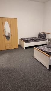 Postel nebo postele na pokoji v ubytování Monteurwohnung 1 Bitterfeld