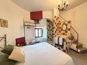Postel nebo postele na pokoji v ubytování Agi Torre Quimeta Apartments + 37 fotografií