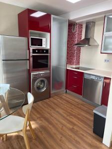 Kuchyňa alebo kuchynka v ubytovaní Apartamentos Castrón Douro