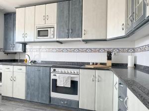 Η κουζίνα ή μικρή κουζίνα στο Apartamento familiar céntrico