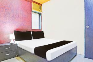 Postel nebo postele na pokoji v ubytování Hotel new shree niwas