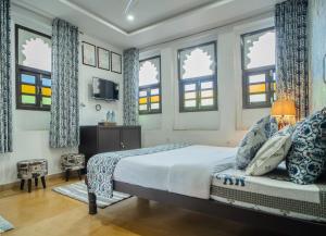 Ένα ή περισσότερα κρεβάτια σε δωμάτιο στο Footprint Hostel Udaipur