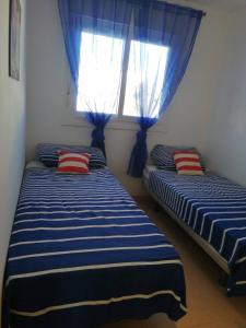 Ένα ή περισσότερα κρεβάτια σε δωμάτιο στο Numptys Villa, Condado De Alhama +7 φωτογραφίες