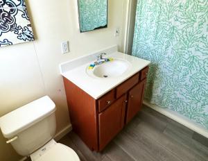 Ein Badezimmer in der Unterkunft Sand Spur Cottages