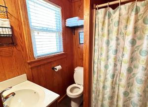 Ein Badezimmer in der Unterkunft Sand Spur Cottages