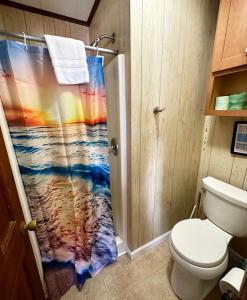 Ein Badezimmer in der Unterkunft Sand Spur Cottages
