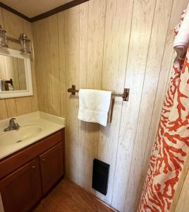 Ein Badezimmer in der Unterkunft Sand Spur Cottages