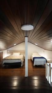 Ένα ή περισσότερα κρεβάτια σε δωμάτιο στο Pousada Areia Cristal +108 φωτογραφίες