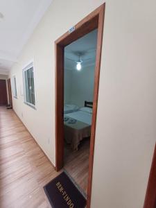 Voodi või voodid majutusasutuse Pousada Estrela Mares 205 toas