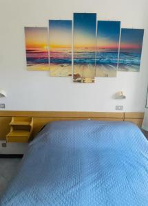 Postel nebo postele na pokoji v ubytování Hotel Villa Pozzi