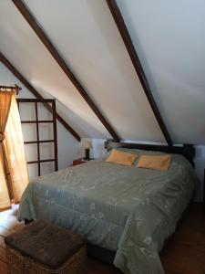 Postel nebo postele na pokoji v ubytování Cabaña Colibrí