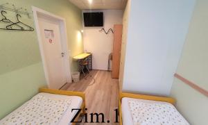 Postel nebo postele na pokoji v ubytování Gästehaus Kristall