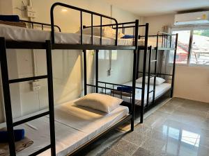 Postel nebo postele na pokoji v ubytování YP Hostel