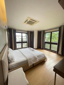 Postel nebo postele na pokoji v ubytování Oasis garden villa Luxury 5-Bedroom , 3200 sqm + 37 fotografií