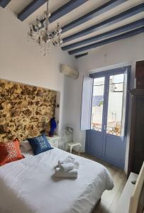 Ένα ή περισσότερα κρεβάτια σε δωμάτιο στο La casa vertical