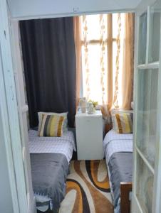 Ένα ή περισσότερα κρεβάτια σε δωμάτιο στο Quarto C