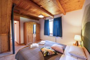 Postel nebo postele na pokoji v ubytování Agriturismo Fattoria Walden