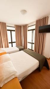 Postel nebo postele na pokoji v ubytování Hotel Mar Azul