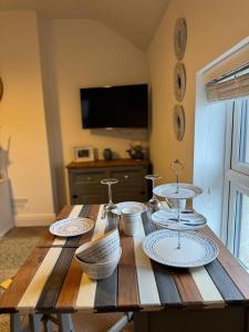 TV a/nebo společenská místnost v ubytování Y Mor Cosy Apartment