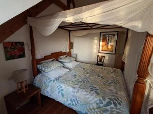 Postel nebo postele na pokoji v ubytování gîte en bord de Loire