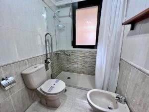 Koupelna v ubytování Apartamentos Arcos Céntrico