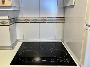 Kuchyň nebo kuchyňský kout v ubytování Apartamentos Arcos Céntrico