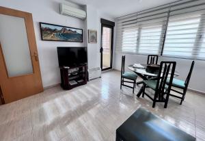 TV a/nebo společenská místnost v ubytování Apartamentos Arcos Céntrico