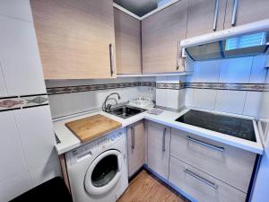 Kuchyň nebo kuchyňský kout v ubytování Apartamentos Arcos Céntrico + 18 fotografií