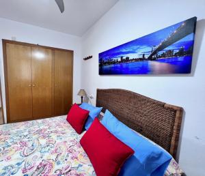 Postel nebo postele na pokoji v ubytování Apartamentos Arcos Céntrico