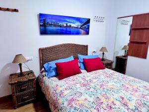Postel nebo postele na pokoji v ubytování Apartamentos Arcos Céntrico