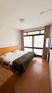 Postel nebo postele na pokoji v ubytování Hotel Mar Azul