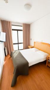 Postel nebo postele na pokoji v ubytování Hotel Mar Azul
