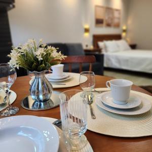 Postel nebo postele na pokoji v ubytování Solar Itaipava Studios