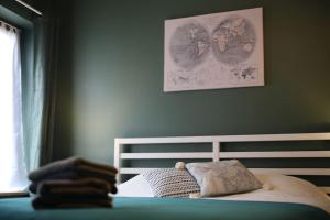 Postel nebo postele na pokoji v ubytování Le Rétro