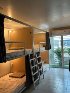 Postel nebo postele na pokoji v ubytování Mawa Anle Hostel