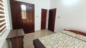 Postel nebo postele na pokoji v ubytování Mom's Villa