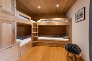 Posteľ alebo postele v izbe v ubytovaní Chalet les 3 cerfs