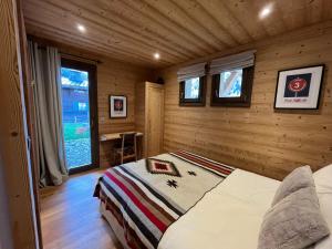 Posteľ alebo postele v izbe v ubytovaní Chalet les 3 cerfs