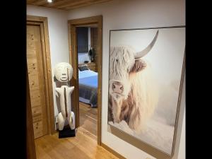 Posteľ alebo postele v izbe v ubytovaní Chalet les 3 cerfs