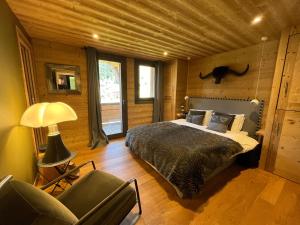 Posteľ alebo postele v izbe v ubytovaní Chalet les 3 cerfs