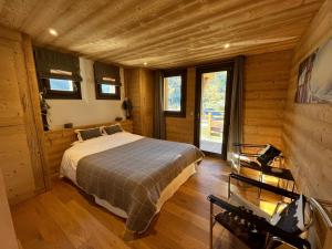 Posteľ alebo postele v izbe v ubytovaní Chalet les 3 cerfs