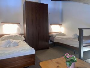 Postel nebo postele na pokoji v ubytování Apartment Residenza Chesa Margun 15-6 by Interhome