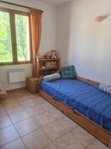 Ένα ή περισσότερα κρεβάτια σε δωμάτιο στο Villa la Baume