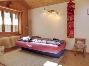 Postel nebo postele na pokoji v ubytování Holiday Home Reindli by Interhome