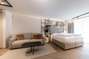 Rúm í herbergi á Hotel Prokulus - Family & Wellness