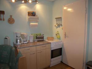 Η κουζίνα ή μικρή κουζίνα στο Bungalow Lange mit 2 Schlafzimmer