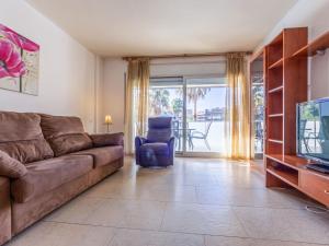 Posedenie v ubytovaní Apartment Aquaria Atico by Interhome