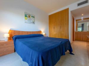 Posteľ alebo postele v izbe v ubytovaní Apartment Aquaria Atico by Interhome