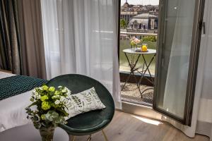 Uma varanda ou terraço em Hotel Suisse