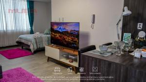 Giường trong phòng chung tại Céntrico y Moderno mono ambiente